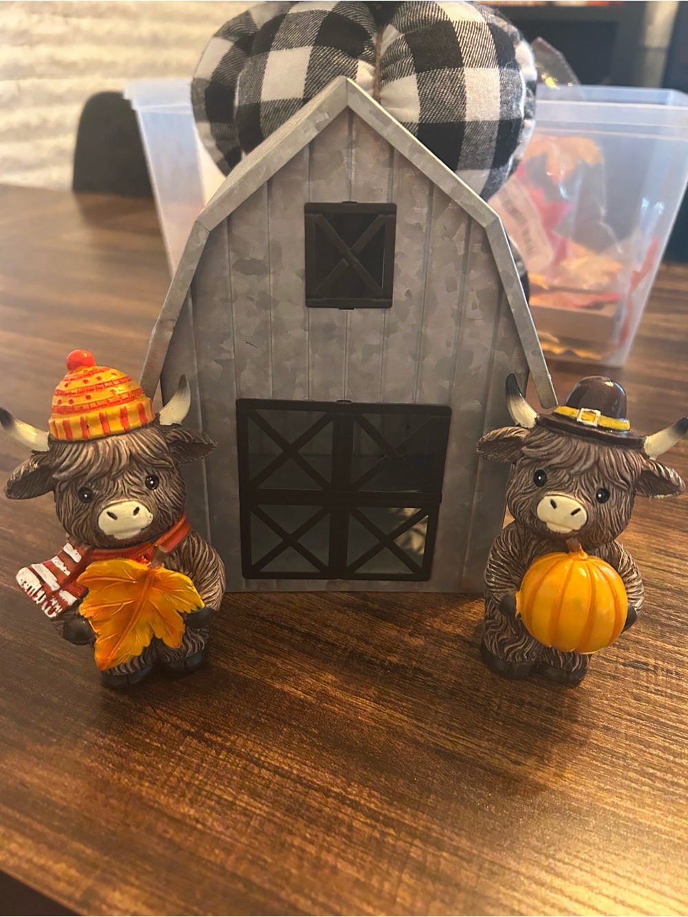 Hobby lobby barn with fall highland cows